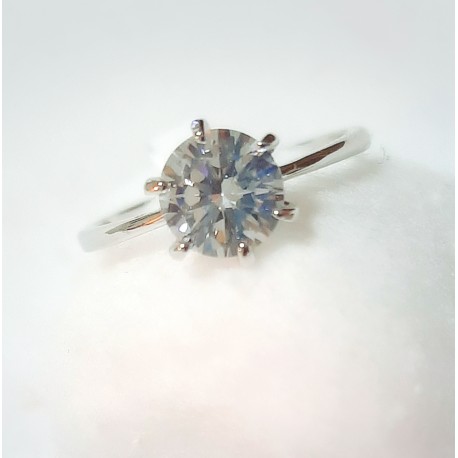 ANILLO DE ACERO Y CIRCONITA.