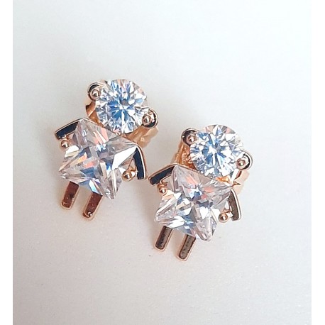 JUEGO DE PENDIENTES CHAPADOS EN ORO BLANCO.